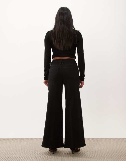 Good American Petite high rise wide leg palazzo jeans in black, 2 of 5