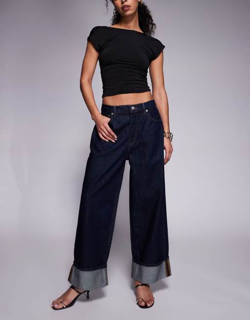 Good American - Posede jeans med opsmøg i mørk indigoblå vask