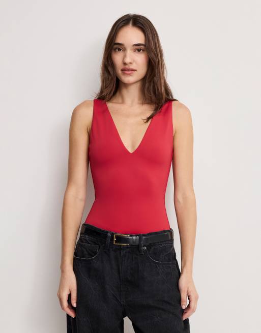 Good American pure cotton v neck bodysuit in ruby red