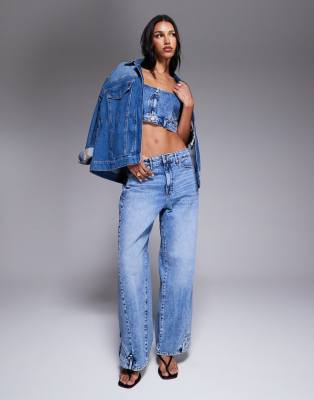 Good American - Reworked - Weit geschnittene Jeans in verwaschenem Hellblau, Kombiteil