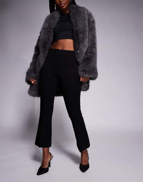 Good American soft stretch ponte kick flare pants in black