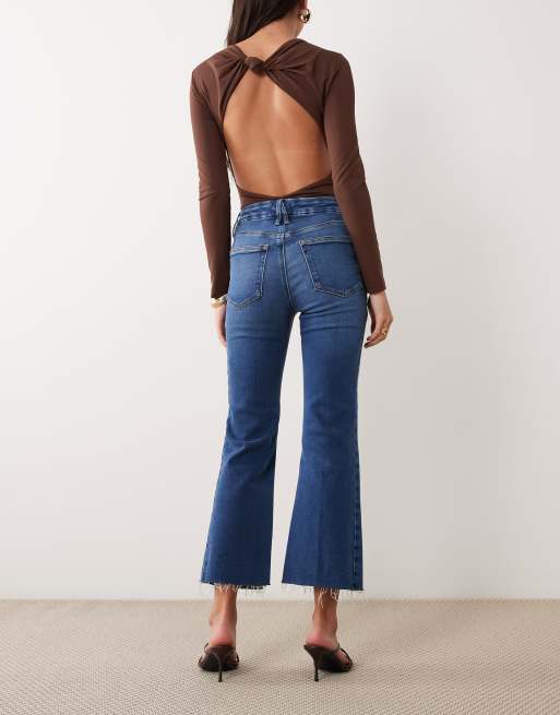 Good American soft tech good legs cropped mini boot jeans in mid wash, 2 of 5