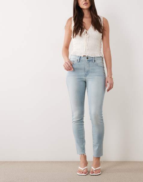 Good American soft tech good legs skinny jeans in light blue wash - view 1