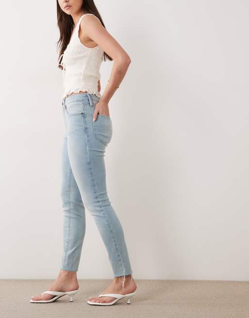 Good American soft tech good legs skinny jeans in light blue wash, 2 of 5