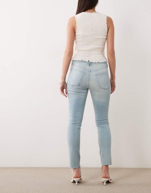 Good American soft tech good legs skinny jeans in light blue wash, 3 of 5