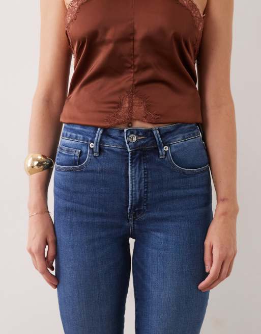 Good American soft tech good legs slim straight leg jeans in mid blue wash, 4 of 5