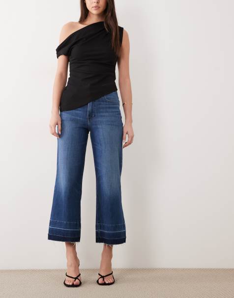 Good American - Soft Tech Good Waist - Mellemblå forvaskede palazzo-jeans med cropped snit - view 1