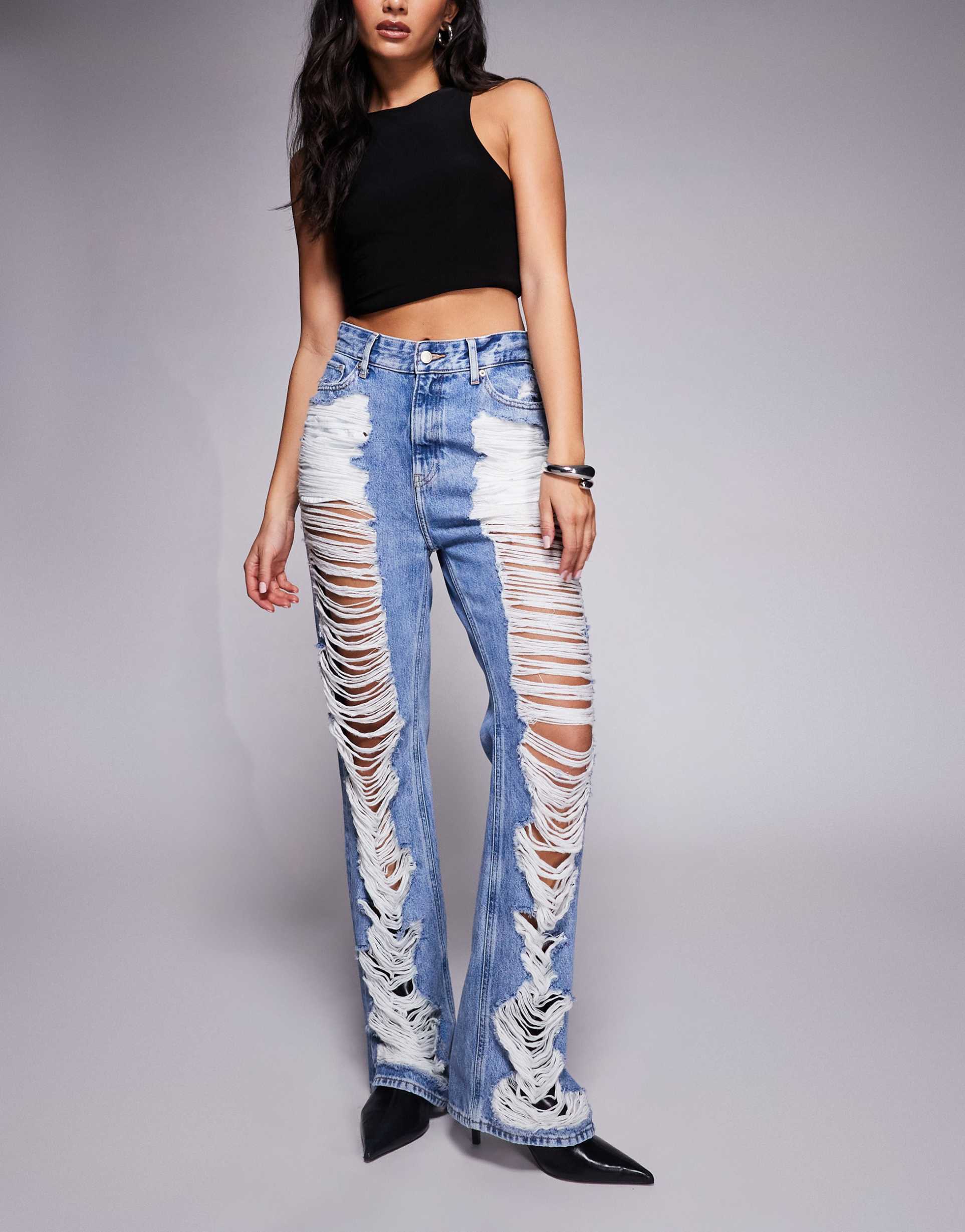 good american the khloé extreme rips high rise jeans in mid blue wash