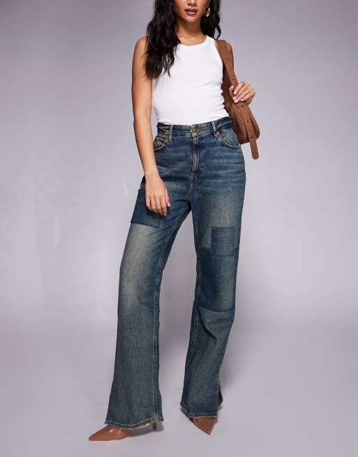 Good American the Khloé patchwork split hem jean in vintage wash
