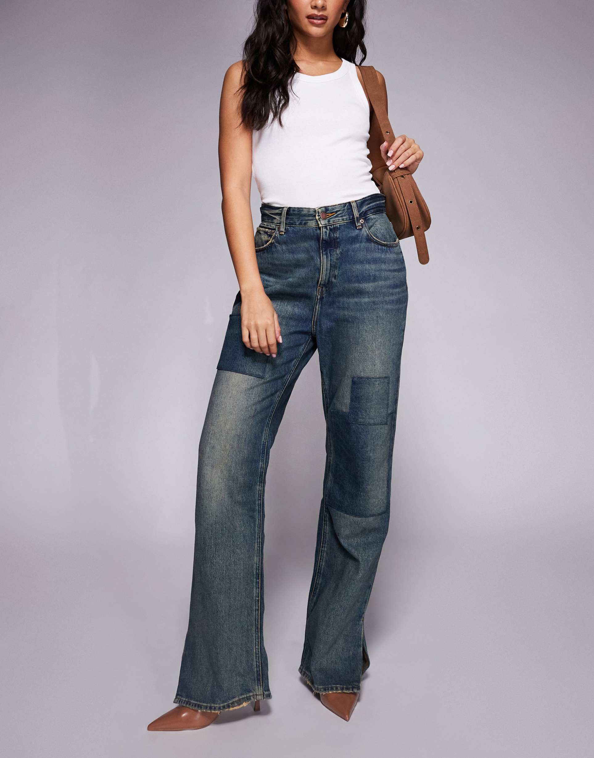 good american the khloé patchwork split hem jeans in vintage wash