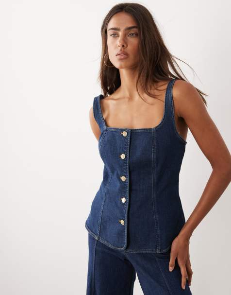 Good American - Top in denim senza maniche lavaggio blu scuro con bottoni sul davanti in coordinato - view 1