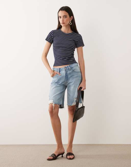 Good American vintage mid rise bermuda denim shorts in light blue wash