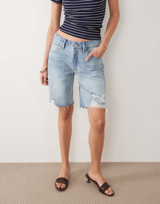 Good American vintage mid rise Bermuda denim shorts in light blue wash, 2 of 5