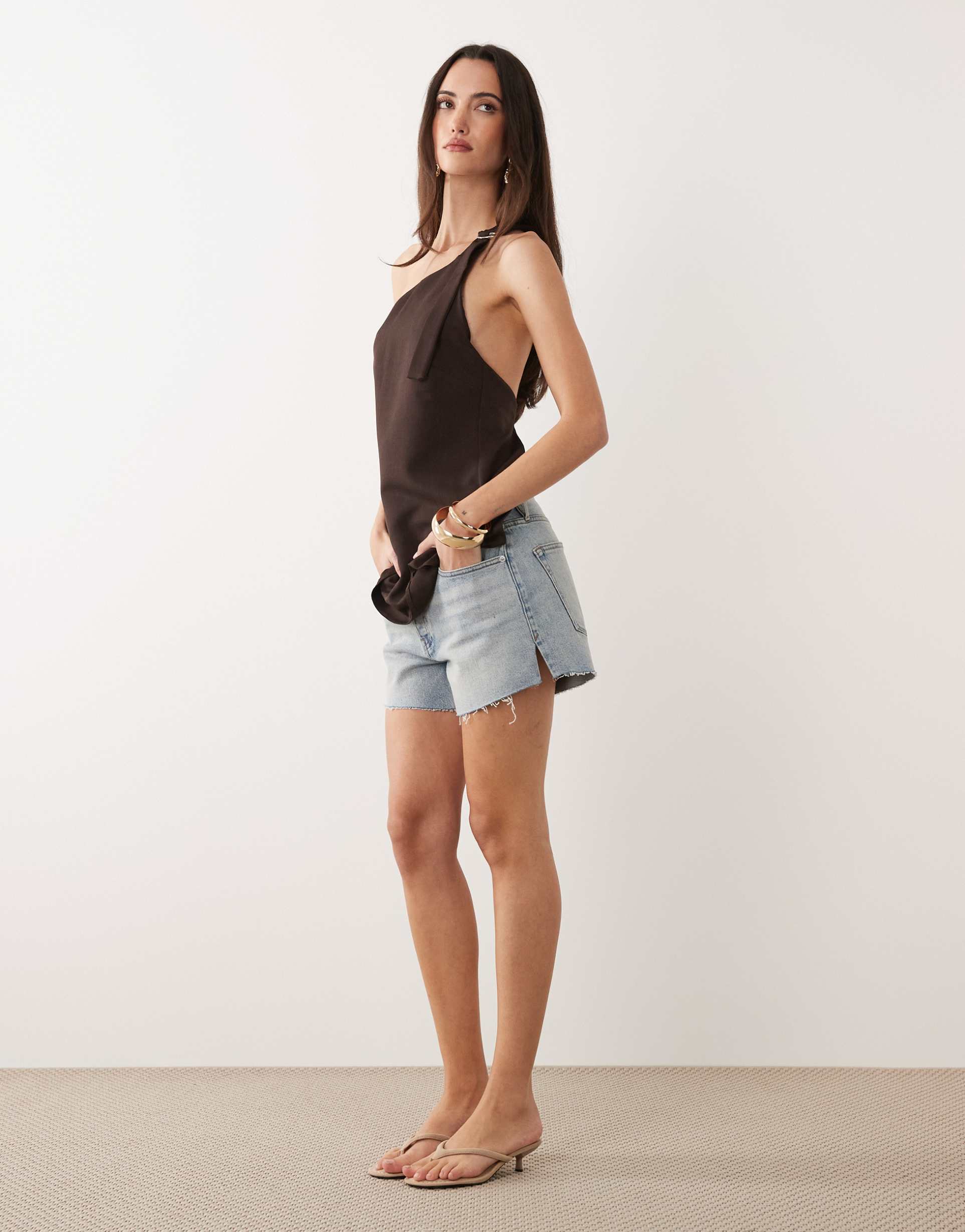 good american vintage mid rise longline denim shorts in light blue wash