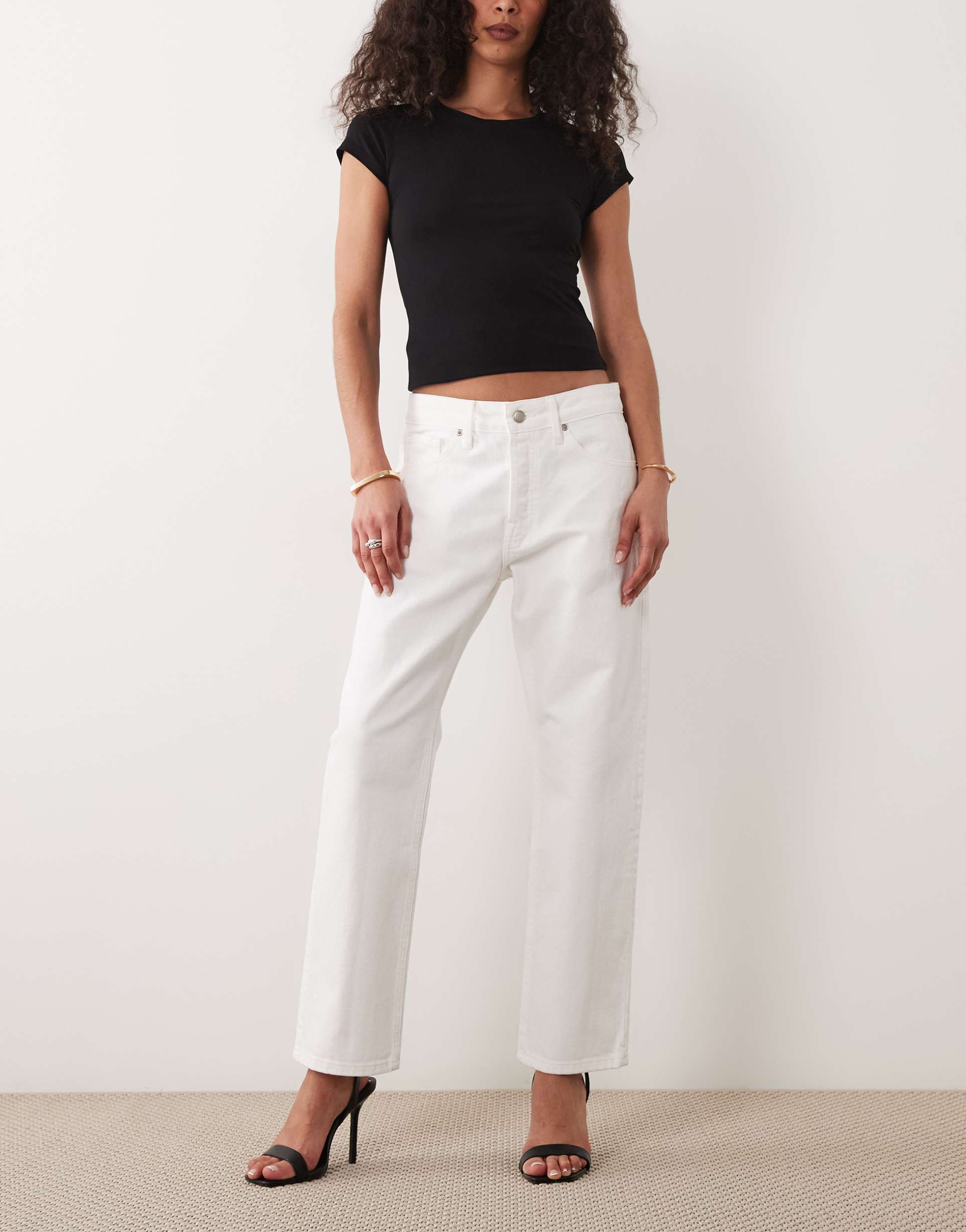 good american vintage mid waist straight leg jeans in white