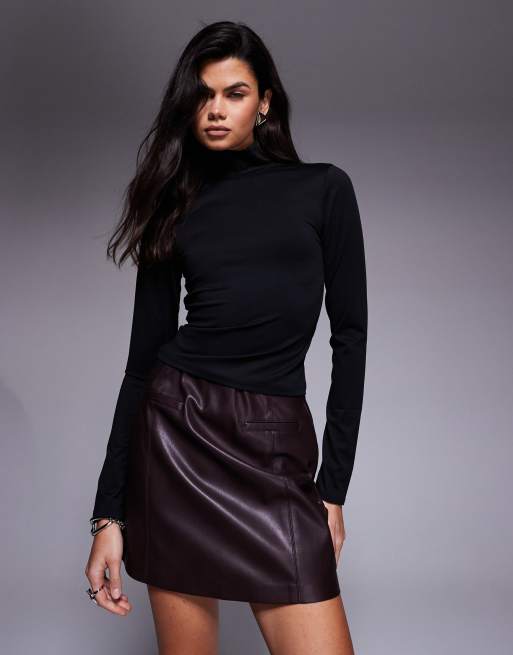 Good American weightless turtleneck in black scuba-style fabric
