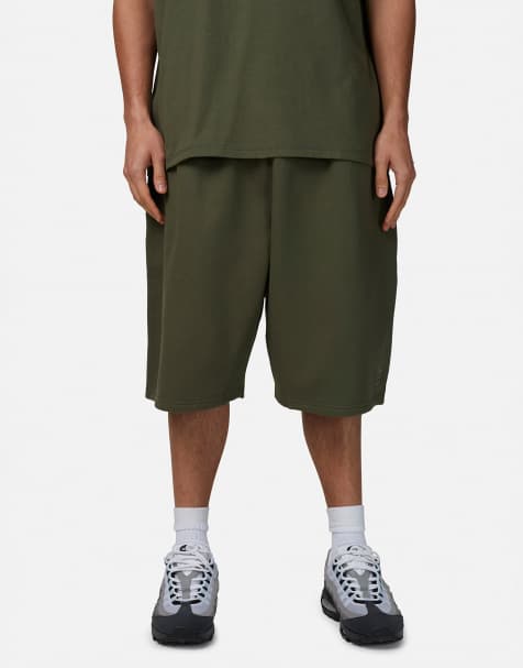 Good For Nothing Baggy monogram jersey shorts in green - view 1