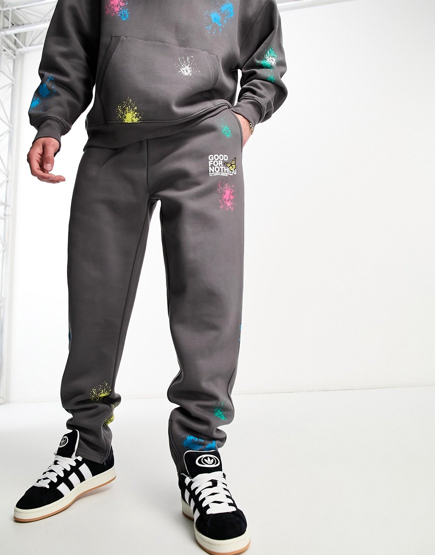 Good For Nothing co-ord straight leg joggers in grey with paint splatter and hem split