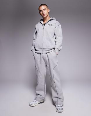 Good For Nothing Coverlock stitching baggy joggers in grey