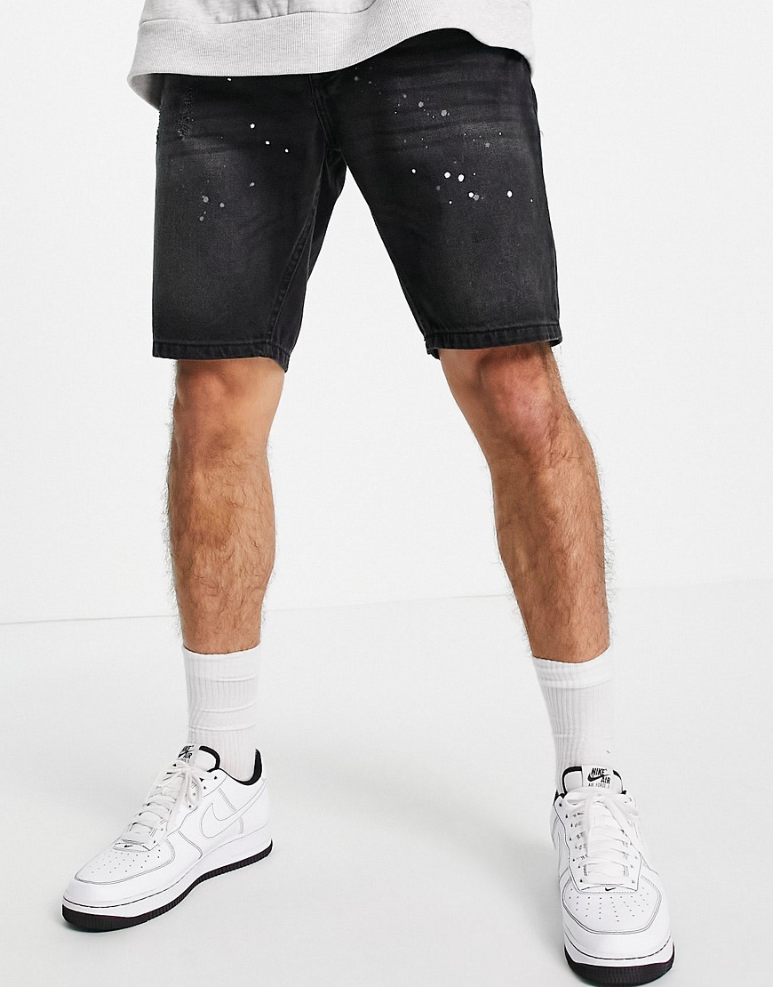 Good For Nothing denim shorts in black with paint splatter and distressing
