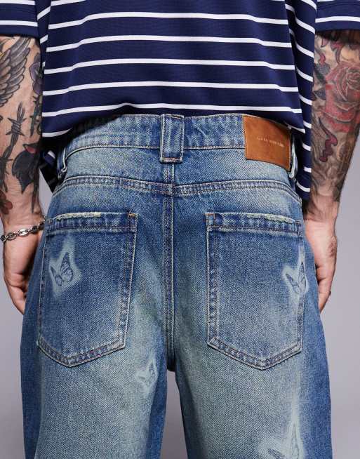 Good For Nothing denim shorts with butterfly print in mid wash blue