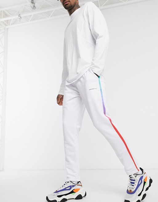 Good for Nothing jersey jogger with rainbow taping in white