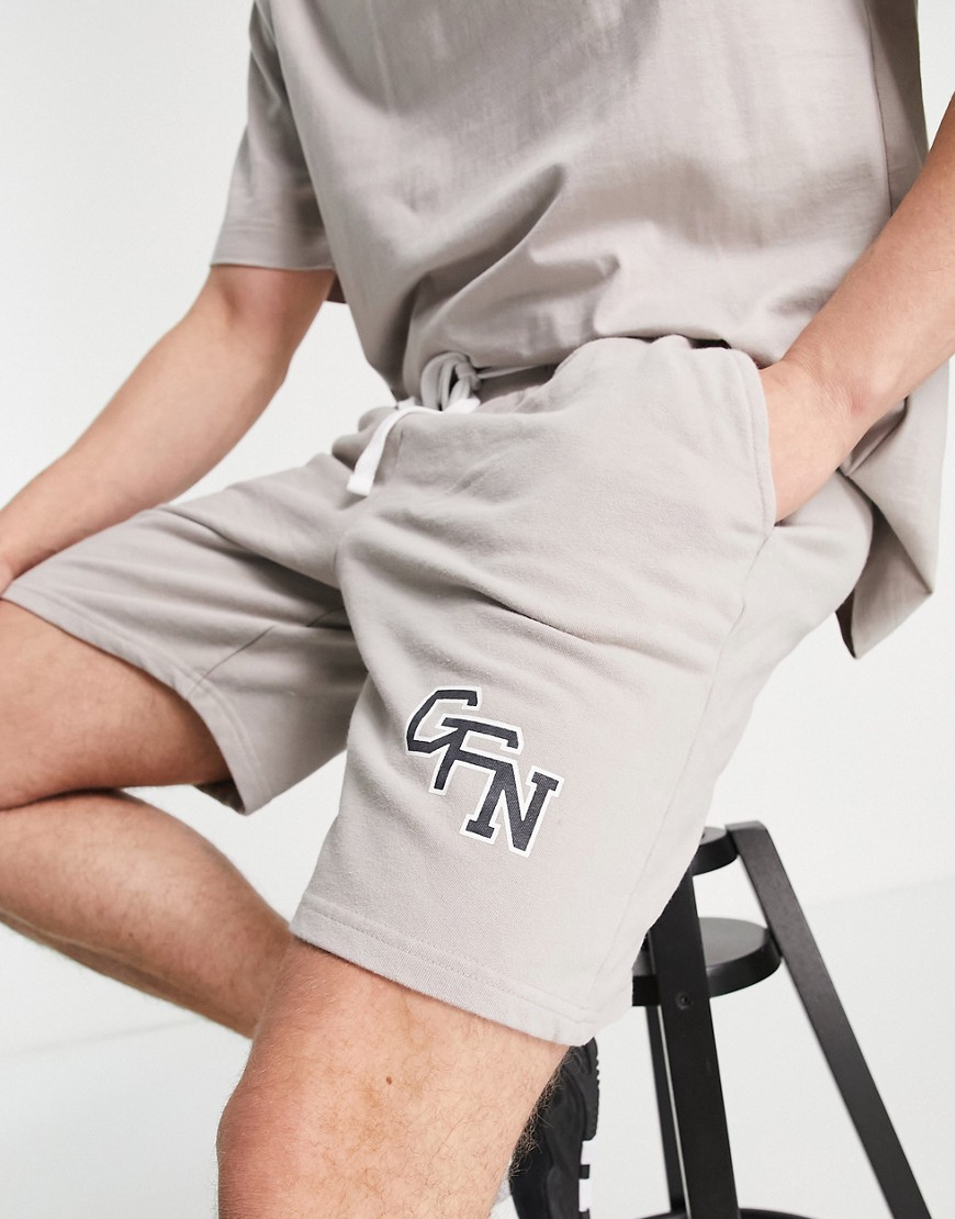 jersey shorts in stone gray with varsity logo print - part of a set