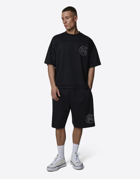 Good For Nothing Monogram  double layered mesh jersey shorts in black - view 1
