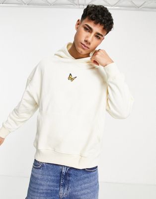 Good For Nothing oversized hoodie in beige with small butterfly chest print
