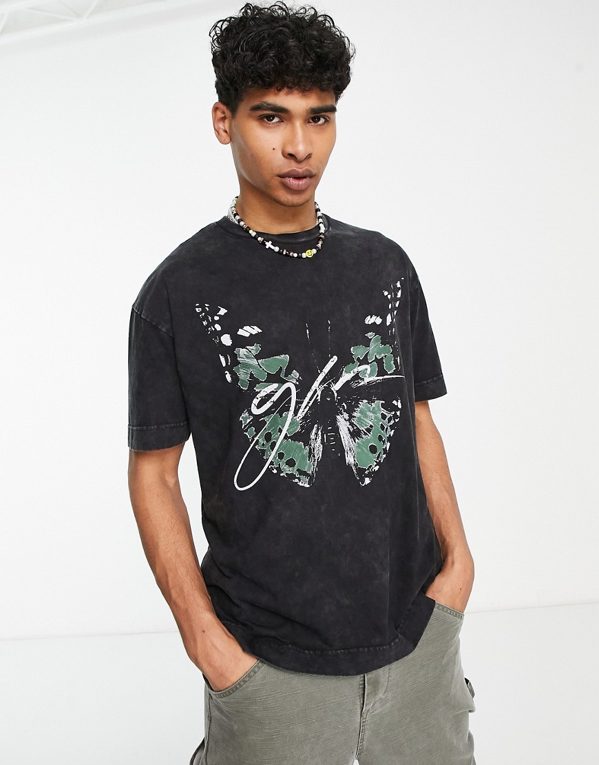 oversized t-shirt in black acid wash with large butterfly print