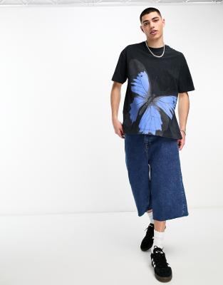 oversized t-shirt in black acid wash with large butterfly print