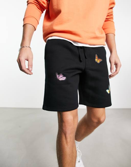 Good For Nothing - Pantaloncini in jersey neri con stampe di farfalle