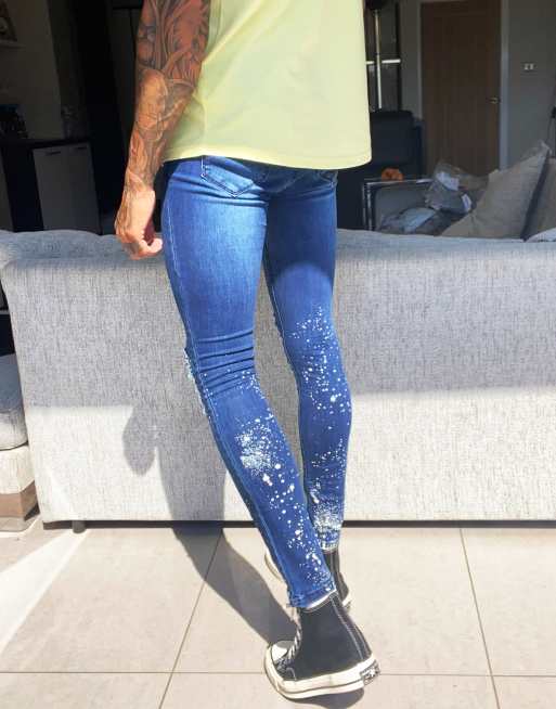 Super Skinny Distressed Paint Splat Jeans