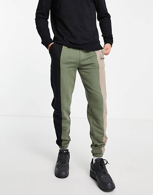 Good For Nothing spliced joggers in black and khaki with mixed logo print