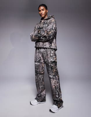 straight leg sweatpants in all over tree print camo-Multi