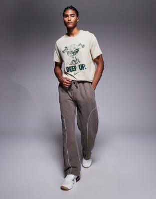 straight leg sweatpants in brown with contrast overlock stitch