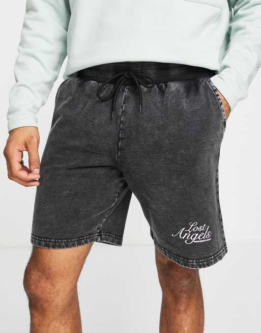 Good For Nothing sweat shorts in black acid wash with text