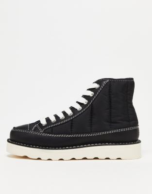 Roopa quilted boots in black