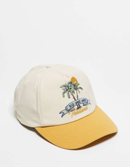 Gorra amarilla unisex con detalle bordado 