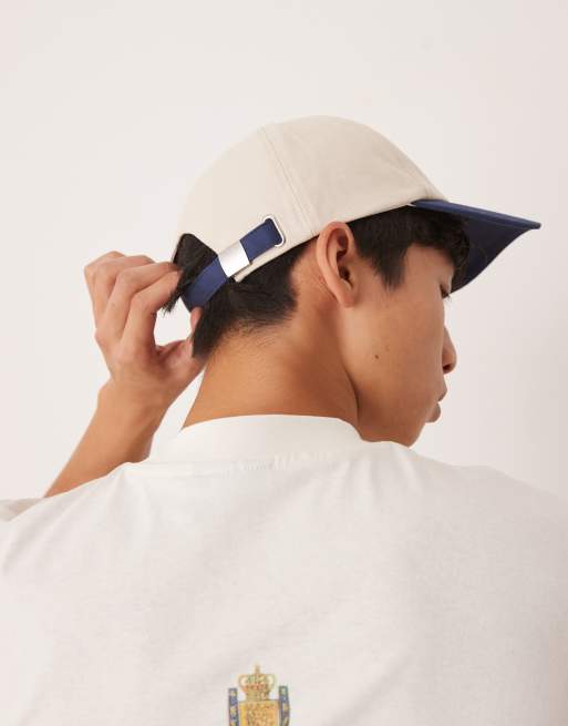 Gorra azul y color crudo con estampado gráfico "Palermo" de ASOS DESIGN, 2 de 3