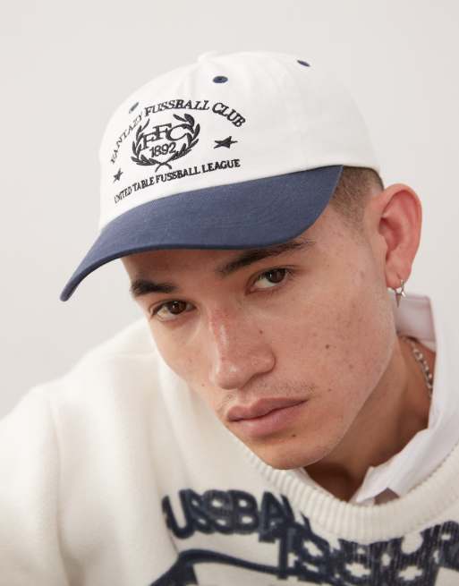 Gorra blanco hueso con bordado gráfico 