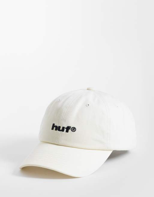 Gorra color crema con diseño de 6 paneles y logo de HUF