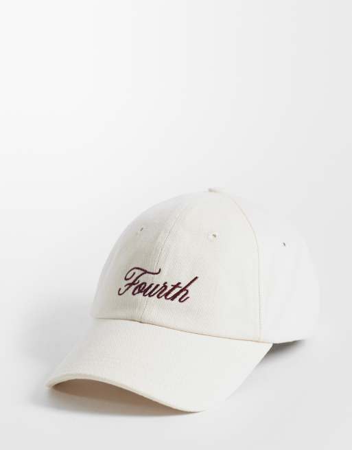 Gorra color crema con logo 