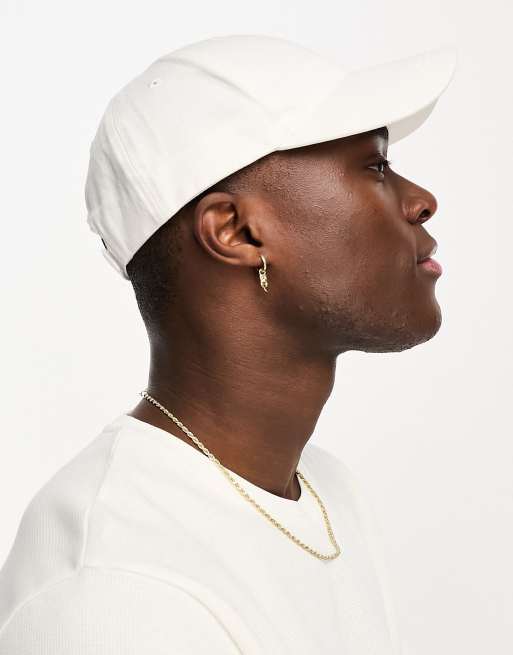 Gorra color crudo liso de New Look