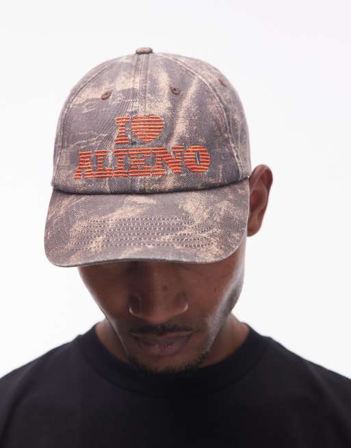 Gorra con estampado de camuflaje y detalle 