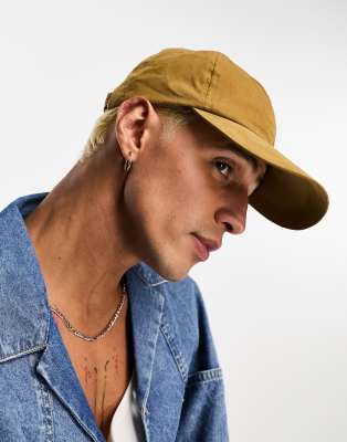 Gorra de béisbol color mostaza de tacto suave de ASOS DESIGN