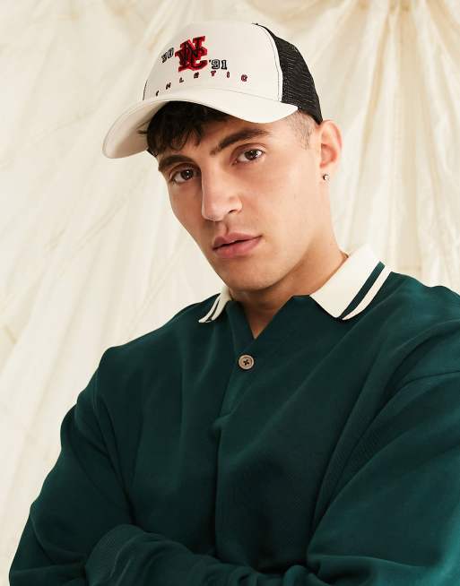 Gorra de camionero color crudo y negra con bordado 