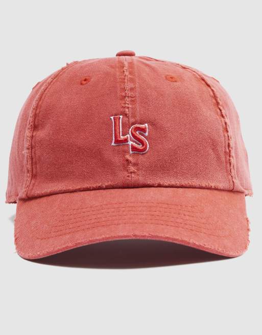 Gorra naranja con tintado descolorido y detalle de monograma LS de Levi's