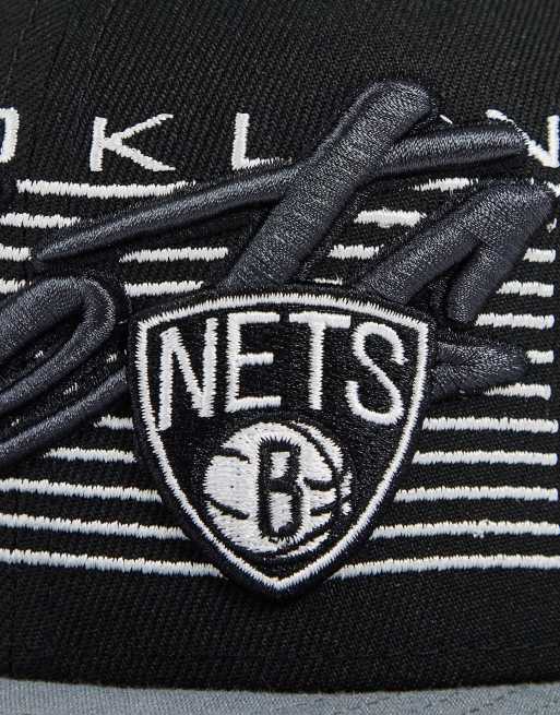 Gorra negra con cierre de botón de presión y diseño de texto de los Brooklyn Nets 9Fifty de New Era , 4 de 4