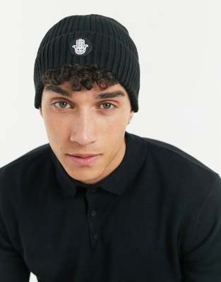 Gorro de punto con motivo de mano de Aura by Calum Best
